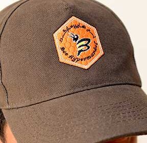 brown caps logo embroidery shops companies in dubai uae