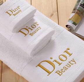 logo branding on white towels in dubai uae